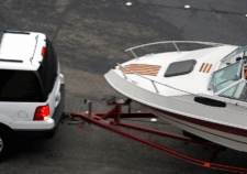 Lakeview-Blog_Sept2021-1 SUV pulling boat and trailer.